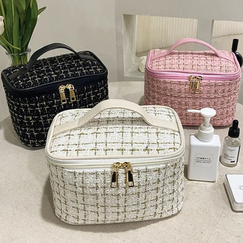 Women's knitted makeup bag in soft pastel colour, front view